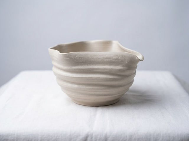 Wheel-thrown ceramic piece