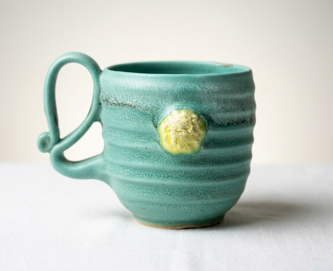 Green glazed mug from the studio