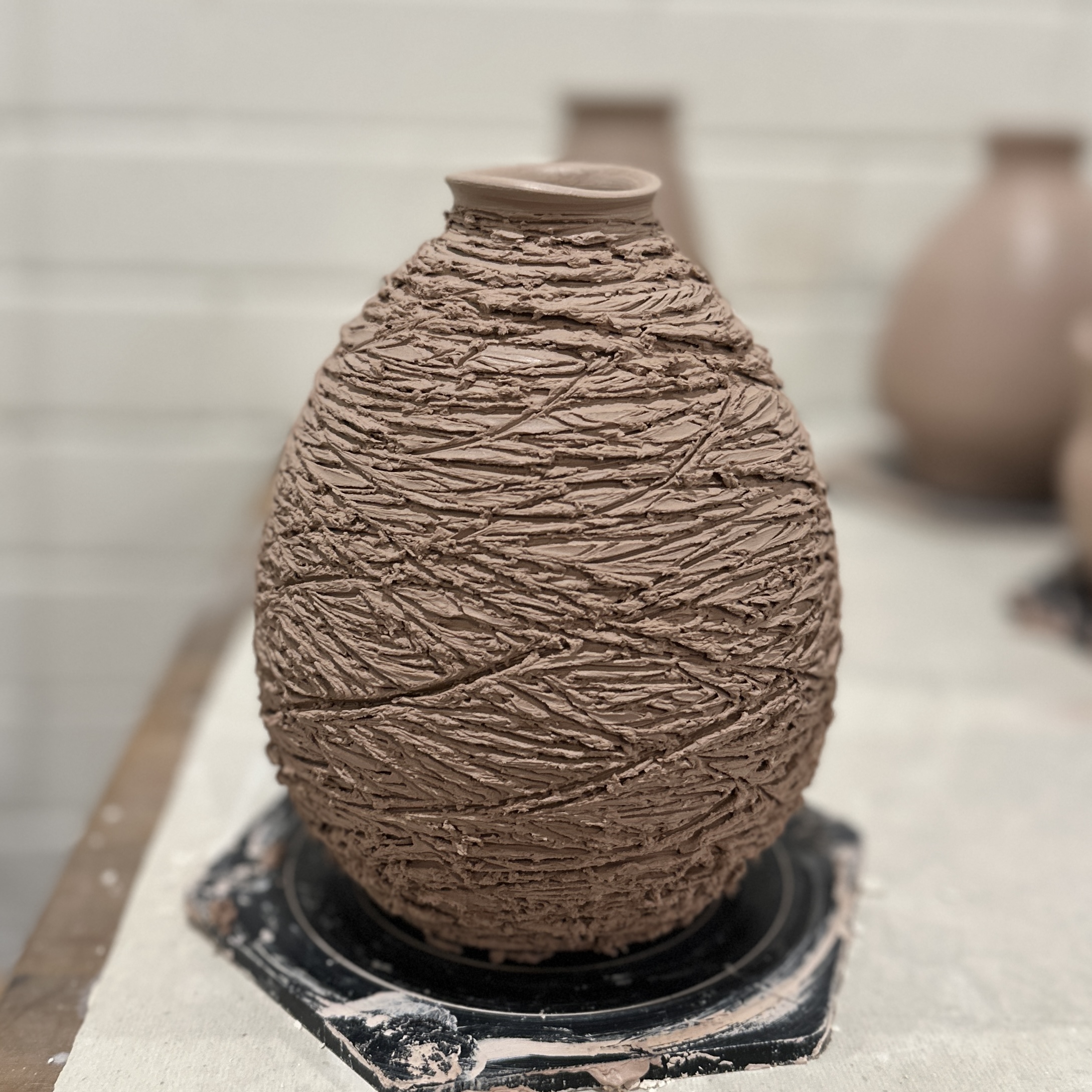 Modern pottery piece with minimalist aesthetic
