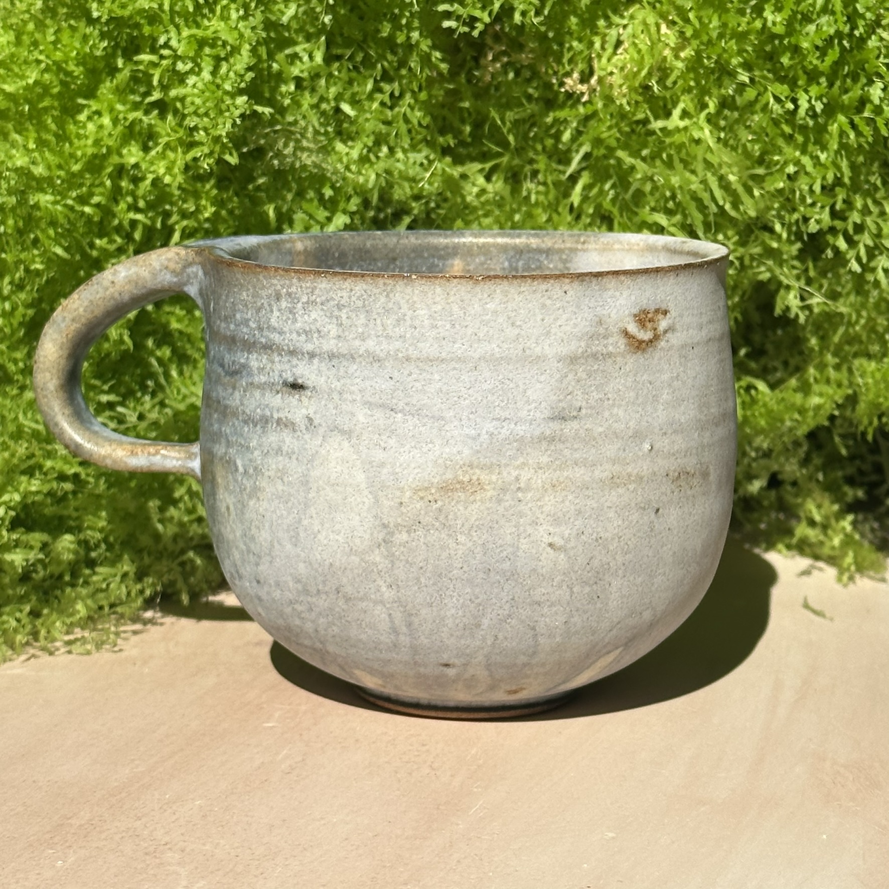Modern ceramic bowl with artistic glaze pattern